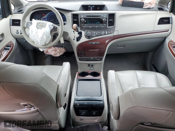 2011 Toyota Sienna XLE AAS с VIN 5TDYK3DC2BS094482, выставлен на аукционе Copart как лот 41777475 с пробегом 183 545 миль миль и Списание • Salvage title. История ставок и продаж доступна на DreamBid. Изображение 8.