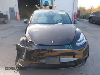 2020 Tesla Model Y Long Range with VIN 5YJYGDEF2LF037298, listed as a IAAI auction lot 37832056 with 40,417 mi miles and . Bid and sale history available at DreamBid. Image 13.