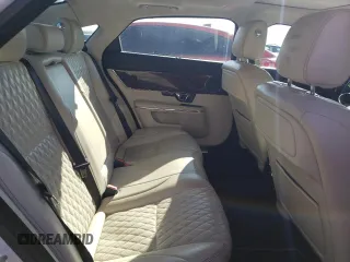 2017 Jaguar XJ with VIN SAJWJ2GD4H8W12163, listed as a Copart auction lot 86993064 with 63,697 mi miles and Salvage Title. Bid and sale history available at carsss.com. Image 10.