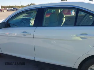 2015 Ford Taurus SEL with VIN 1FAHP2E8XFG182899, listed as a IAAI auction lot 41209454 with 93,477 mi miles and . Bid and sale history available at carsss.com. Image 14.