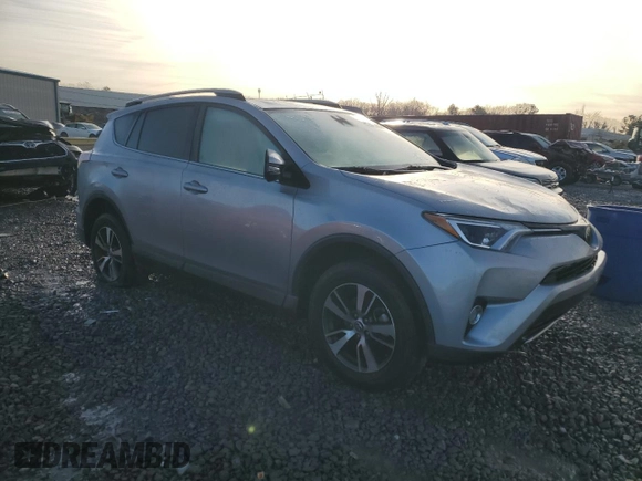 2018 Toyota RAV4 XLE with VIN 2T3WFREV8JW498673, listed as a Copart auction lot 87608275 with 93,439 mi miles and Salvage Title. Bid and sale history available at carsss.com. Image 4.