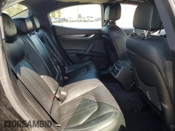 2017 Maserati Ghibli S с VIN ZAM57RSA1H1212595, выставлен на аукционе Copart как лот 52111405 с пробегом 55 158 миль миль и Списание • Salvage title. История ставок и продаж доступна на DreamBid. Изображение 11.