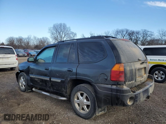 2005 GMC Envoy SLT with VIN 1GKDT13S552310799, listed as a Copart auction lot 43586125 with 182,928 mi miles and Salvage Title. Bid and sale history available at carsss.com. Image 2.
