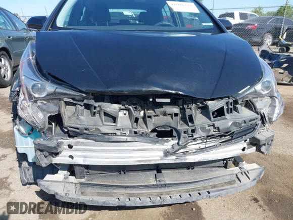 2016 Toyota Prius Two with VIN JTDKBRFU9G3021083, listed as a IAAI auction lot 41986733 with 117,227 mi miles and . Bid and sale history available at DreamBid. Image 6.