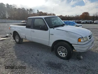 2002 Mazda B-Series 2WD Truck DS with VIN 4F4YR46E52TM16539, listed as a Copart auction lot 82949474 with 201,917 mi miles and Salvage Title. Bid and sale history available at carsss.com. Image 4.