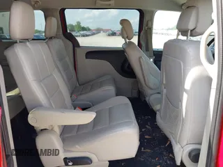 2014 Dodge Grand Caravan American Value with VIN 2C4RDGBG6ER309449, listed as a IAAI auction lot 42148824 with 198,532 mi miles and . Bid and sale history available at DreamBid. Image 8.