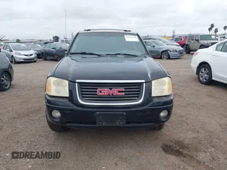 2003 GMC Envoy SLT z VIN 1GKDS13S232298062, wystawiony jako IAAI lot #41668380 z przebiegiem 195 045 mil mil oraz . Historia ofert i sprzedaży dostępna na DreamBid. Obrazek 12.