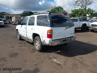 2003 Chevrolet Tahoe Z71 with VIN 1GNEK13T53R109296, listed as a IAAI auction lot 41659341 with 223,479 mi miles. Bid and sale history available at carsss.com. Image 3.