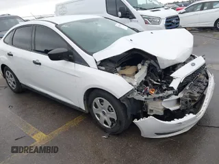 2018 Ford Focus S with VIN 1FADP3E24JL284750, listed as a IAAI auction lot 41673433 with 124,443 mi miles. Bid and sale history available at carsss.com. Image 1.