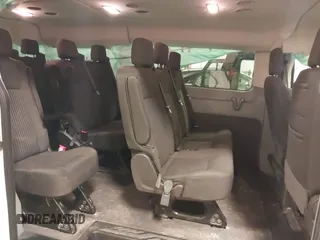 2019 Ford Transit Passenger XL with VIN 1FBZX2YM7KKA22871, listed as a IAAI auction lot 41721561 with 112,189 mi miles. Bid and sale history available at carsss.com. Image 8.
