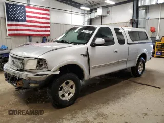 1999 Ford F-150 с VIN 1FTRX18W2XKB01444, выставлен на аукционе Copart как лот 52717195 с пробегом 210 581 миль миль и Чистый • Clean title. История ставок и продаж доступна на DreamBid. Изображение 1.