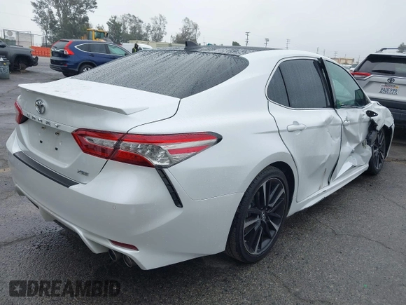 2018 Toyota Camry XSE with VIN 4T1BZ1HK8JU019394, listed as a IAAI auction lot 41492529 with 107,745 mi miles and . Bid and sale history available at DreamBid. Image 4.