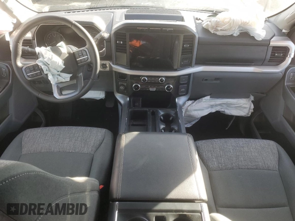 2023 Ford F-150 XL with VIN 1FTEW1EP6PFB72153, listed as a Copart auction lot 42869255 with 13,039 mi miles and Salvage Title. Bid and sale history available at carsss.com. Image 8.
