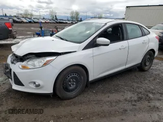 2012 Ford Focus SE with VIN 1FAHP3F24CL305924, listed as a Copart auction lot 56863455 with 77,602 mi miles and Salvage title. Bid and sale history available at DreamBid. Image 1.