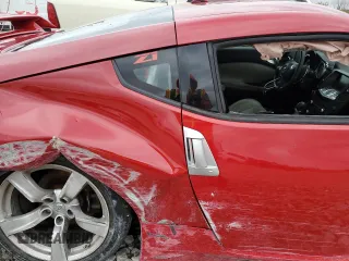 2009 Nissan 370Z z VIN JN1AZ44E19M400603, wystawiony jako Copart lot #79878474 z przebiegiem 129 976 mil mil oraz Szkoda całkowita • Salvage title. Historia ofert i sprzedaży dostępna na DreamBid. Obrazek 10.
