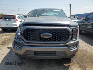 2021 Ford F-150 XL z VIN 1FTMF1E58MKD90530, wystawiony jako Copart lot #61824123 z przebiegiem 5 656 mil mil oraz . Historia ofert i sprzedaży dostępna na DreamBid. Obrazek 5.