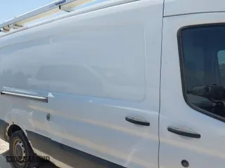 2019 Ford Transit Van with VIN 1FTBW2CM3KKB42223, listed as a IAAI auction lot 41965322 with 140,755 mi miles. Bid and sale history available at carsss.com. Image 12.