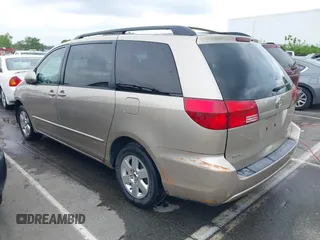 2004 Toyota Sienna XLE with VIN 5TDZA22CX4S205206, listed as a IAAI auction lot 42007779 with 173,794 mi miles. Bid and sale history available at carsss.com. Image 3.