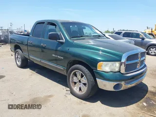 2002 Dodge 1500 z VIN 3D7HA18N32G155796, wystawiony jako IAAI lot #42401001 z przebiegiem 145 259 mil mil oraz . Historia ofert i sprzedaży dostępna na DreamBid. Obrazek 1.