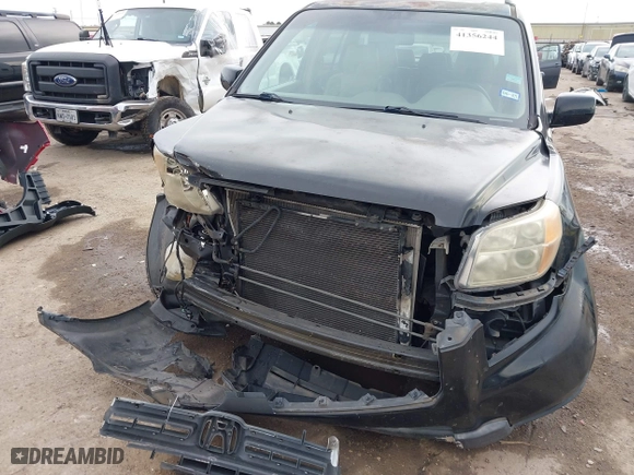 2007 Honda Pilot EX-L with VIN 5FNYF28557B027087, listed as a IAAI auction lot 41356244 with 183,923 mi miles. Bid and sale history available at carsss.com. Image 6.