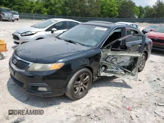 2009 Kia Optima LX z VIN KNAGE228295335935, wystawiony jako Copart lot #59155405 z przebiegiem 293 582 mil mil oraz Szkoda całkowita • Salvage title. Historia ofert i sprzedaży dostępna na DreamBid. Obrazek 1.