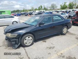 2002 Honda Accord EX z VIN 1HGCG16582A057594, wystawiony jako Copart lot #54874665 z przebiegiem 173 709 mil mil oraz Szkoda całkowita • Salvage title. Historia ofert i sprzedaży dostępna na DreamBid. Obrazek 1.
