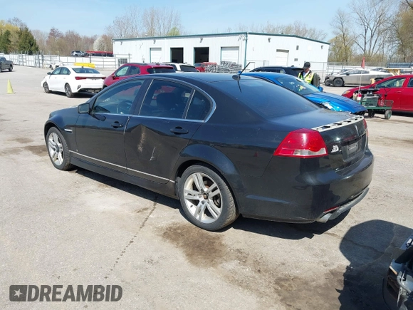 2009 Pontiac G8 with VIN 6G2ER57769L185606, listed as a IAAI auction lot 42112142 with 187,365 mi miles. Bid and sale history available at carsss.com. Image 3.
