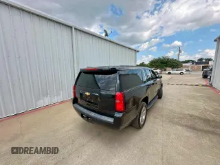 2015 Chevrolet Suburban LT with VIN 1GNSKJKC3FR153922, listed as a Copart auction lot 64337945 with 238,441 mi miles and Clean title. Bid and sale history available at DreamBid. Image 4.