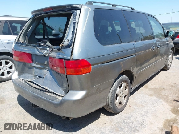 2001 Honda Odyssey EX z VIN 2HKRL18621H541553, wystawiony jako IAAI lot #42469447 z przebiegiem 241 701 mil mil oraz . Historia ofert i sprzedaży dostępna na DreamBid. Obrazek 4.