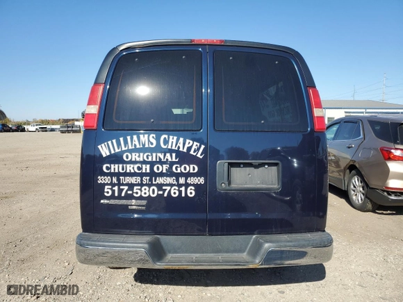 2014 Chevrolet Express Passenger LT with VIN 1GAZG1FG9E1197581, listed as a Copart auction lot 76876634 with 41,840 mi miles and Salvage Title. Bid and sale history available at carsss.com. Image 6.