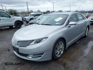 2014 Lincoln MKZ with VIN 3LN6L2G99ER824115, listed as a IAAI auction lot 41946660 with 134,323 mi miles. Bid and sale history available at carsss.com. Image 2.