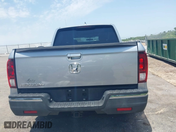 2018 Honda Ridgeline RTL z VIN 5FPYK2F5XJB001064, wystawiony jako IAAI lot #42252956 z przebiegiem 95 272 mil mil oraz . Historia ofert i sprzedaży dostępna na DreamBid. Obrazek 17.