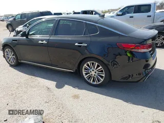 2016 Kia Optima SXL Turbo with VIN 5XXGV4L29GG086468, listed as a IAAI auction lot 41933581 with 186,881 mi miles. Bid and sale history available at carsss.com. Image 3.