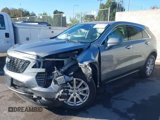 2023 Cadillac XT4 FWD Luxury with VIN 1GYAZAR43PF185264, listed as a IAAI auction lot 40659418 with 11,666 mi miles. Bid and sale history available at carsss.com. Image 2.