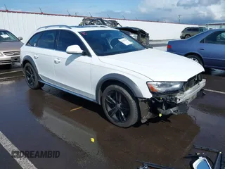 2014 Audi allroad A4 Premium Plus z VIN WA1UFAFL4EA073150, wystawiony jako IAAI lot #41913548 z przebiegiem 97 509 mil mil oraz . Historia ofert i sprzedaży dostępna na DreamBid. Obrazek 1.