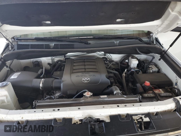 2021 Toyota Tundra Platinum z VIN 5TFAY5F14MX963197, wystawiony jako Copart lot #56002725 z przebiegiem 84 941 mil mil oraz Szkoda całkowita • Salvage title. Historia ofert i sprzedaży dostępna na DreamBid. Obrazek 11.