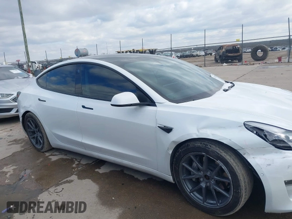 2021 Tesla Model 3 Long Range with VIN 5YJ3E1EB9MF059554, listed as a IAAI auction lot 41231520 with 63,696 mi miles and . Bid and sale history available at DreamBid. Image 12.