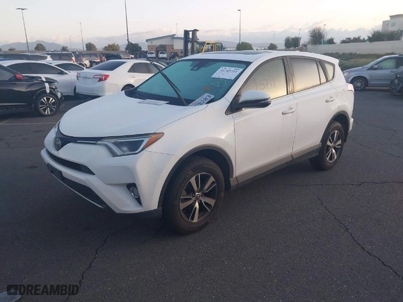 2018 Toyota RAV4 XLE with VIN JTMWFREV1JJ151684, listed as a IAAI auction lot 41745711 with 122,139 mi miles. Bid and sale history available at carsss.com. Image 2.