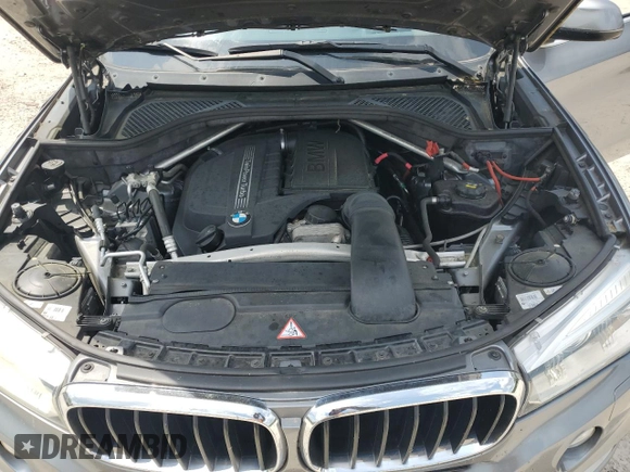 2014 BMW X5 xDrive35i z VIN 5UXKR0C54E0K46819, wystawiony jako Copart lot #54607325 z przebiegiem 135 489 mil mil oraz Szkody całkowita. Historia ofert i sprzedaży dostępna na DreamBid. Obrazek 12.
