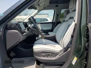 2022 Rivian R1T Adventure z VIN 7FCTGAAA5NN013983, wystawiony jako Copart lot #68013724 z przebiegiem 9006 mil mil oraz Szkody całkowita. Historia ofert i sprzedaży dostępna na DreamBid. Obrazek 7.