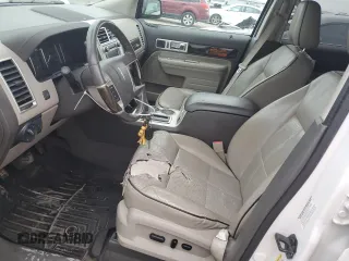 2009 Lincoln MKX with VIN 2LMDU68C79BJ12359, listed as a Copart auction lot 81906694 with 215,549 mi miles and Salvage Title. Bid and sale history available at DreamBid. Image 7.