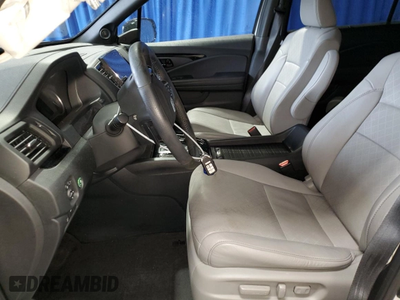 2022 Honda Passport Elite with VIN 5FNYF8H05NB004199, listed as a Copart auction lot 48521594 with 23,913 mi miles. Bid and sale history available at carsss.com. Image 7.