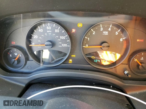 2012 Jeep Compass Latitude with VIN 1C4NJDEB6CD630669, listed as a Copart auction lot 52028235 with 124,123 mi miles and Salvage Title. Bid and sale history available at DreamBid. Image 9.