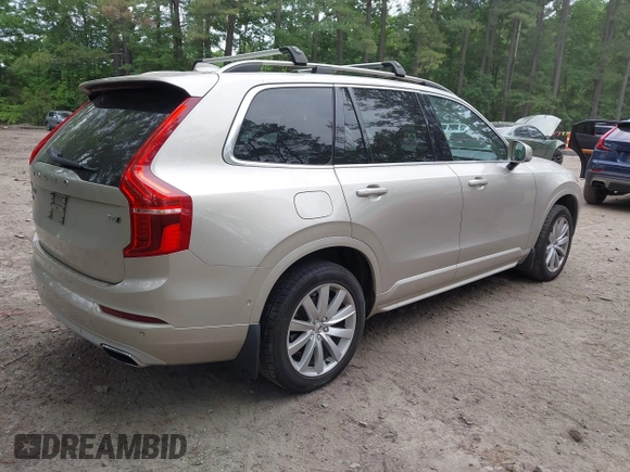 2016 Volvo XC90 T6 Momentum z VIN YV4A22PK9G1054528, wystawiony jako IAAI lot #42425643 z przebiegiem 130 138 mil mil oraz . Historia ofert i sprzedaży dostępna na DreamBid. Obrazek 4.