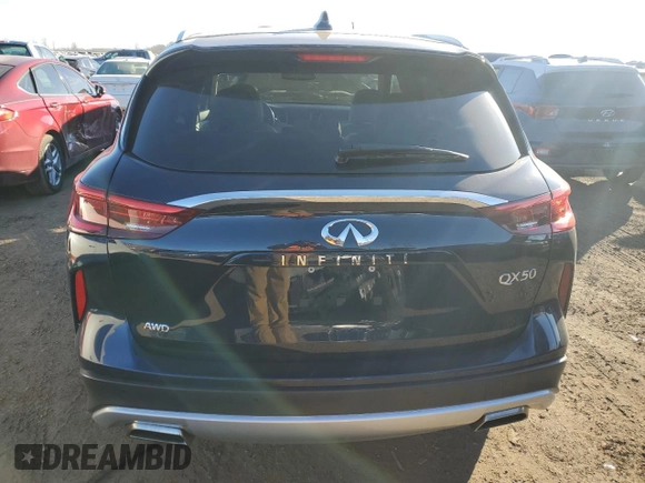 2021 Infiniti QX50 Essential z VIN 3PCAJ5CB7MF100390, wystawiony jako Copart lot #87265874 z przebiegiem 35 830 mil mil oraz Szkoda całkowita • Salvage title. Historia ofert i sprzedaży dostępna na DreamBid. Obrazek 6.