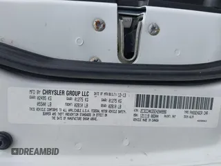 2014 Chrysler 300 C with VIN 2C3CCAKG5EH200996, listed as a IAAI auction lot 42201747 with 156,121 mi miles and . Bid and sale history available at carsss.com. Image 9.
