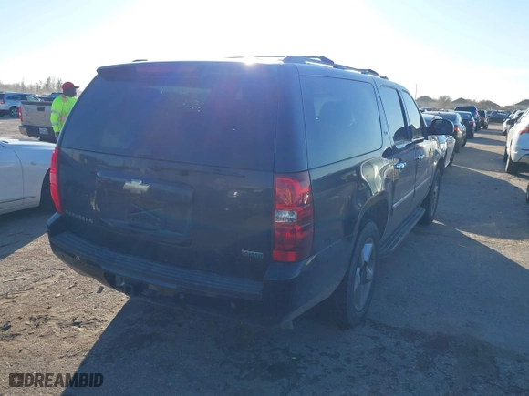 2011 Chevrolet Suburban LTZ with VIN 1GNSCKE00BR353106, listed as a IAAI auction lot 41393001 with 252,968 mi miles. Bid and sale history available at carsss.com. Image 4.