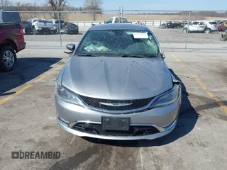 2015 Chrysler 200 C with VIN 1C3CCCCG0FN509701, listed as a IAAI auction lot 41873084 with Not Provided miles and . Bid and sale history available at carsss.com. Image 12.