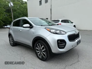 2018 Kia Sportage EX z VIN KNDPNCAC2J7485647, wystawiony jako Copart lot #59206305 z przebiegiem 90 877 mil mil oraz Tytuł czysty. Historia ofert i sprzedaży dostępna na DreamBid. Obrazek 1.