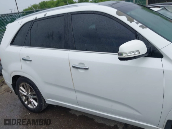 2014 Kia Sorento SX Limited with VIN 5XYKW4A75EG444230, listed as a IAAI auction lot 42540409 with 134,339 mi miles and . Bid and sale history available at DreamBid. Image 14.